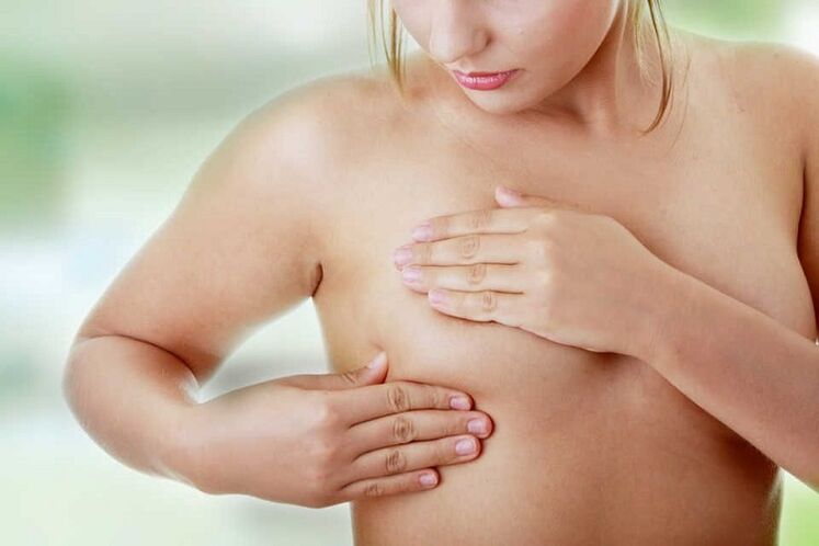 examen de mamas después de la cirugía de aumento
